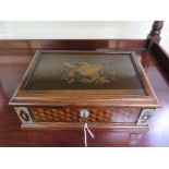 A large late 19th century inlaid box, the lid portraying a lady's hat and walking sticks amid