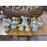 Ten Victorian stoneware relief moulded jugs, including Charles Meigh Julius Caesar no. 9, 24 cm