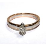 A single stone marquise diamond ring, set in 18 carat yellow gold