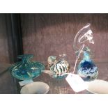 Three pieces of Mdina glass, signed to base - seahorse paperweight, pair of bird paperweights and