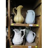 Eleven Victorian and later stoneware relief moulded jugs, including two depicting corncobs,