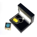 A 925 silver key ring in a box together with a 22ct gold plated snooker cue chalk (2)