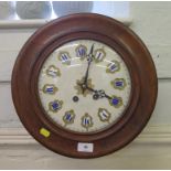 A late 19th century French style wall clock, with enamelled chapters, enclosing a twin train