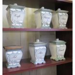 A set of six late 19th century French kitchen storage jars, in the Art Nouveau style, one with later