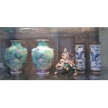 A pair of Chinese blue and white crackle glaze cylindrical vases, depicting a pair of dragons,