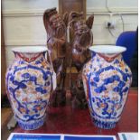 A pair of Japanese carved wood okimono figures, inset with wire decoration, depicting dancing