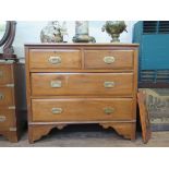 An Edwardian stained beech chest, of two short and two long drawers on bracket feet, 85.5 cm wide