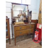 An Edwardian stained beech dressing table, with swing mirror, two short and one long drawers on