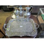 A collection of silver plate to include two trays and three coffee pots