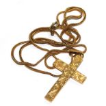 An 18 carat gold cross, on a 9 carat neck chain