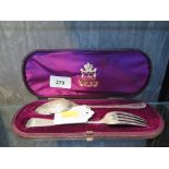 A Mappin and Webb cased silver spoon and fork, London 1875, by Henry Holland