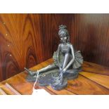 A bronze finish figure of a young ballerina, by Regency, 15 cm high