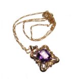A 14 carat gold amethyst pendant, on gold neck chain