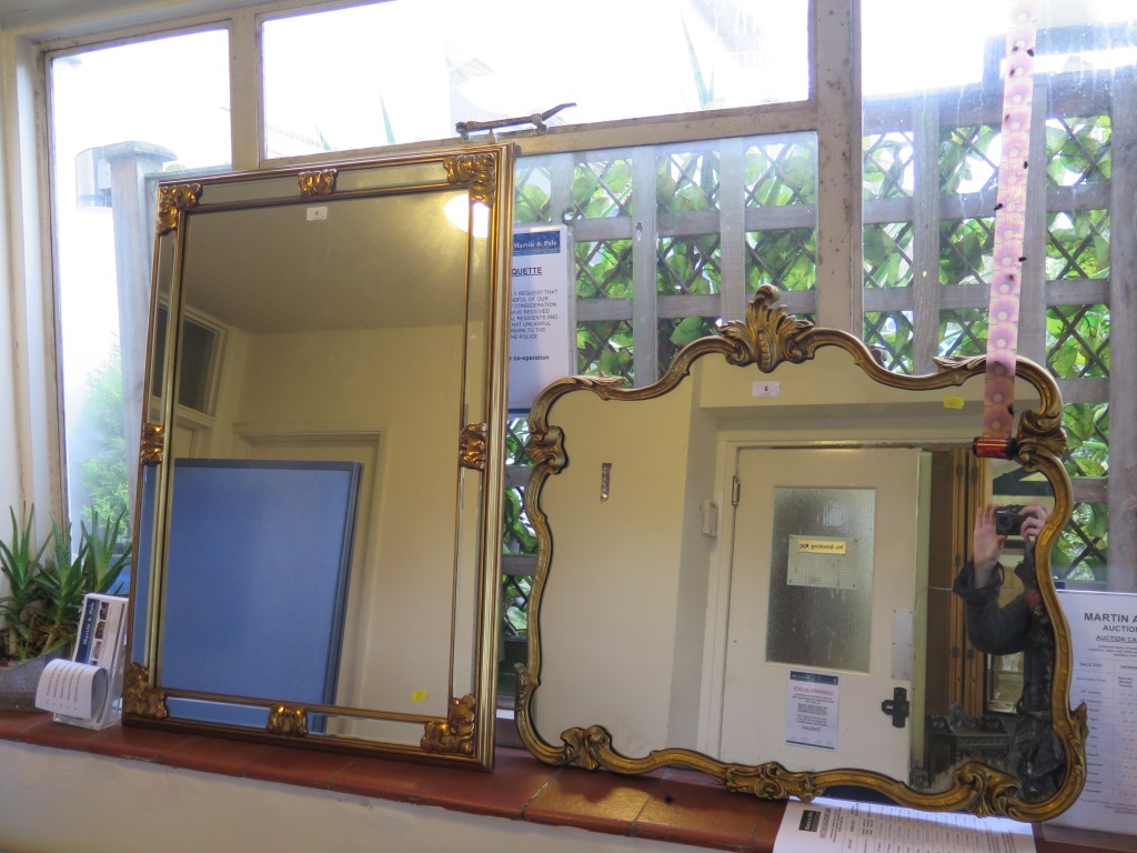 A rectangular giltwood wall mirror, with bevelled plate frame, 95 x 68 cm, and another shaped mirror