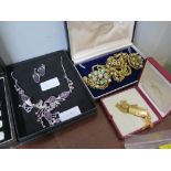 A collection of costume jewellery to include a Swiss watch in working order, a necklace and some