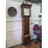 An early 19th century crossbanded oak longcase clock, the gilt ball finials over a painted square