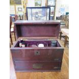 A 19th century brass bound mahogany apothecary's box, the hinged lid enclosing partitions, over a