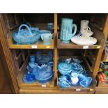 Two blue glass egg baskets, in the shape of chickens on baskets, and various other early 20th