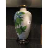 A Chinese Jingfa cloisonne vase with floral design, 26.5cm high, with carved wooden stand and