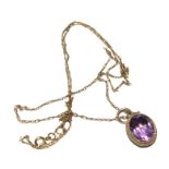 An amethyst pendant on fine gold neck chain