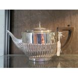 A silver tea pot, gadrooned decoration, W Hutton & Sons Ltd, Sheffield, 1923, 14 cm high, 503g total