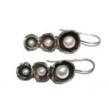 A pair of pearl set drop earrings