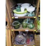 A collection of Victorian and later coloured pressed glass, including baskets, plates, dishes