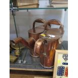 Two copper watering cans, two diaper pattern brass dishes and various other brassware