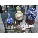 Oriental ceramics and wares including blue and white prunus blossom and cracked ice bottle vase,