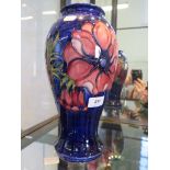 A Moorcroft baluster form anemone shape vase, 31 cm high, monogram mark for Walter Moorcroft
