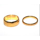 Two 22 carat gold wedding rings