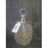 A cut glass scent bottle with silver collar, Birmingham 1887, and facet cut stopper
