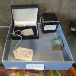 A Sterling silver key ring, boxed, and a 22ct gold plated snooker cue chalk (2)