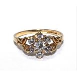 A 9 carat gold ring set with cubic zircon
