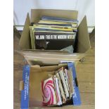 A collection of LP records including Bob Dylan 'Blonde on Blonde', The Jam 'This is The Modern