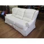 A G-Plan three seat 'Cheyney Court' settee, with cream loose outer covers