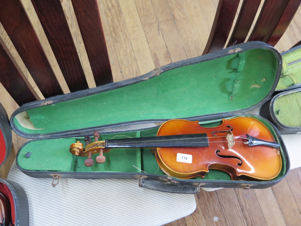 A violin, no label, with two piece back, 55.5 cm long, in an earlier case