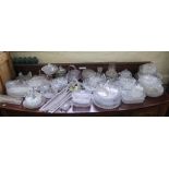 A large collection of Victorian and later clear press glass wares, including bowls, baskets, dishes,