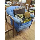 A 1920s blue button back upholstered arm chair with cabriole legs and pad feet