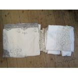 Two 20th century lace and embroidery table cloths, one with taupe lace work (2)