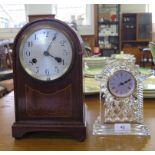 A Waterford Crystal quartz table clock, 17.5 cm high, and an Edwardian mahogany table clock, 28.5 cm
