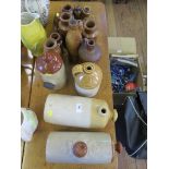 A collection of stoneware hot water bottles and other vessels (18)