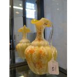 A Victorian pale yellow glass ewer vase with clear handle and enamelled floral decoration, 25 cm