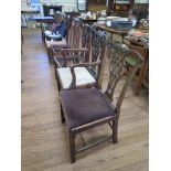 A harlequin set of eight George III style mahogany dining chairs, with interlaced splats, drop-in