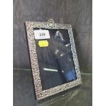 A 999 silver photo frame, with decorative cast border, London 1994
