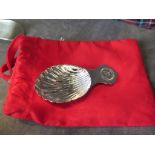 A 'The Wolseley' Art Deco shell design tea caddy spoon with engraved Wolseley monogram