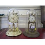 A brass anniversary clock, the cream dial with Arabic numerals, within a glass dome, 29cm high,