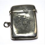 A silver vesta case