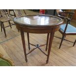 An Edwardian inlaid mahogany oval window table, with detachable glass tray, on square section