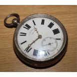 A gentleman's open faced silver key wind pocket watch, with white enamel dial and Roman numerals,